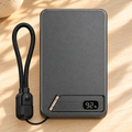 Gray MagStand Pro power bank with folding stand, digital display and USB-C cable loop